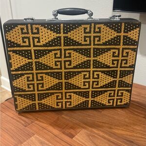 Vintage Tiruray woven rafia black and tan geometric briefcase with keys.